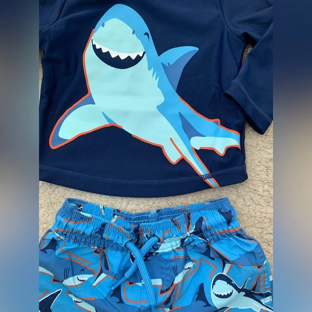 Carter’s Three Piece Swim Set with Bucket Hat, Rash Guard and Shark Swim Trunks